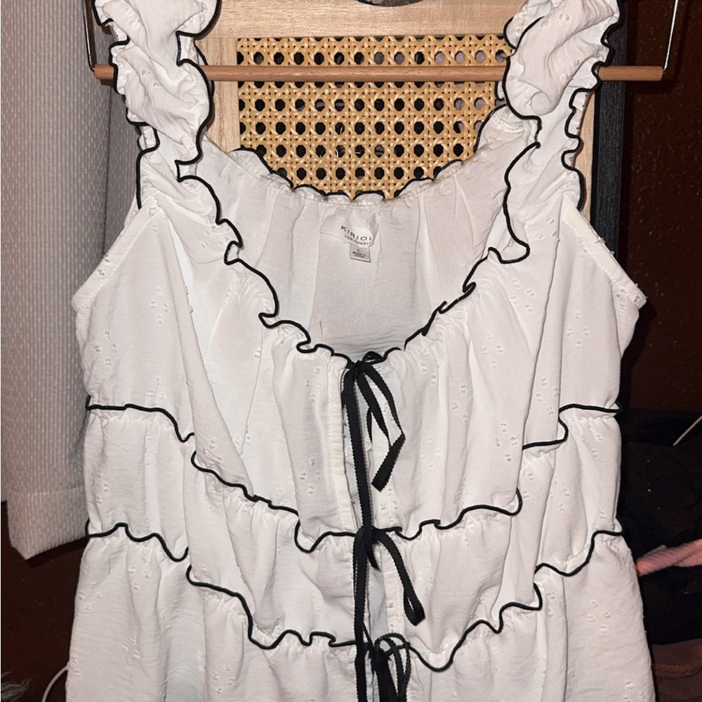 White Sleeveless Ruffled Blouse with Tie Front